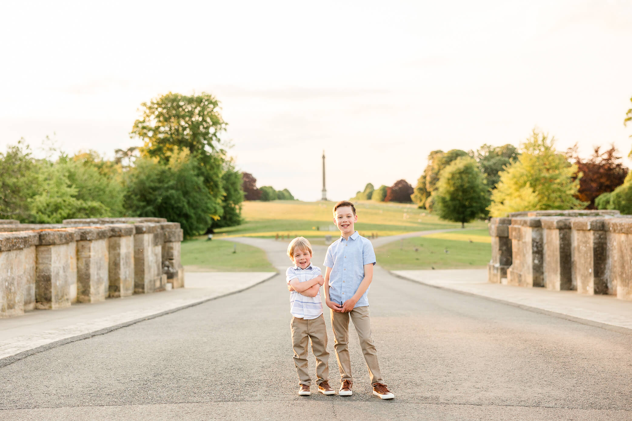 two young boys standing on a bridge at Blenheim Palace after visiting their Woodstock pediatricians