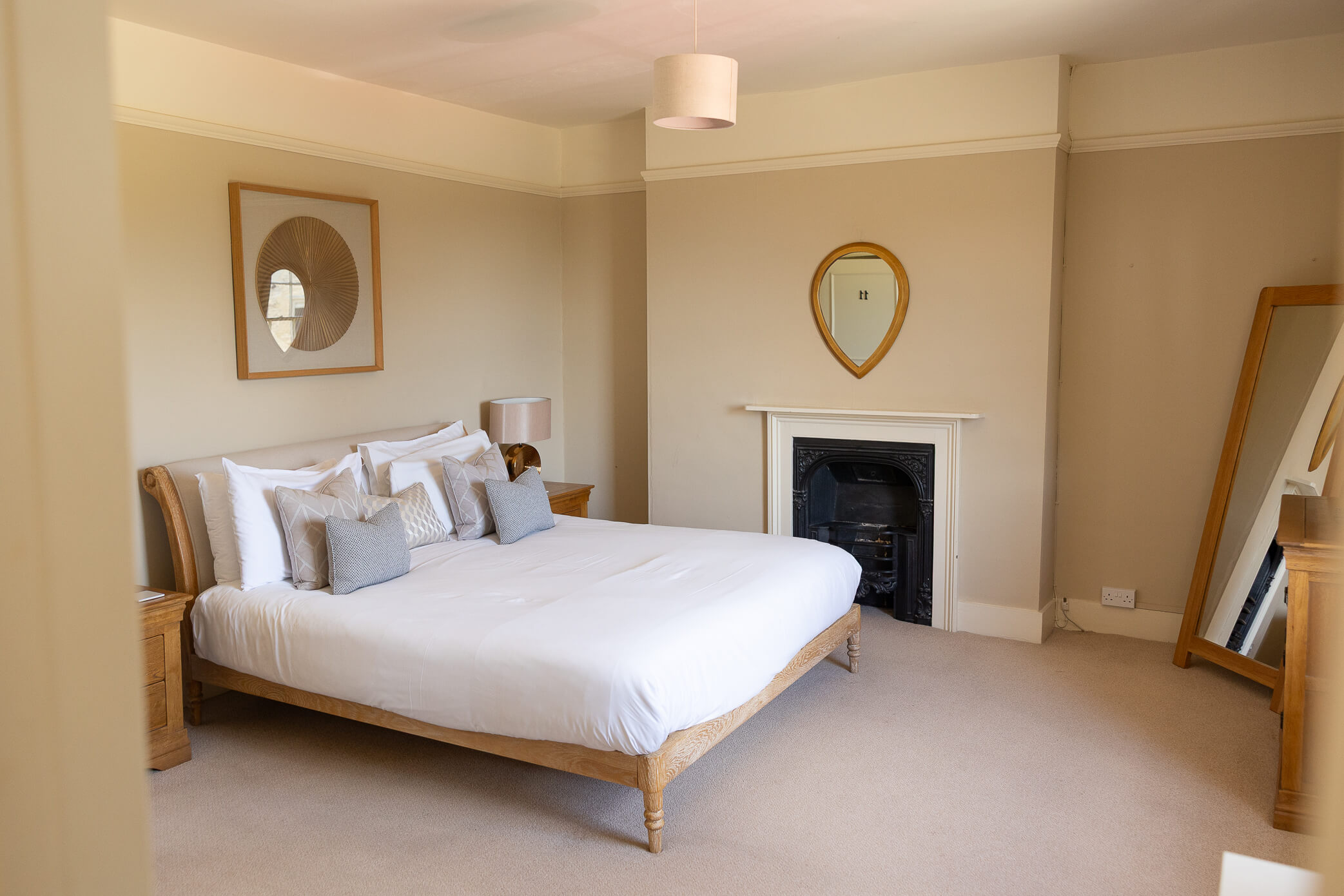 Accommodation room for guests with a large, comfortable bed and a bathroom attached.